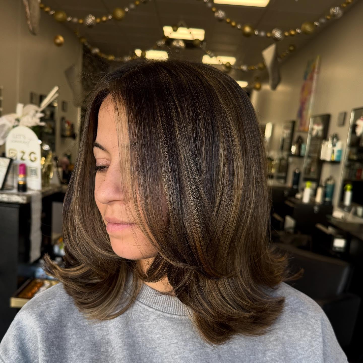 Warm Chestnut Mid-Length Layers with Face-Framing Ribbon Highlights