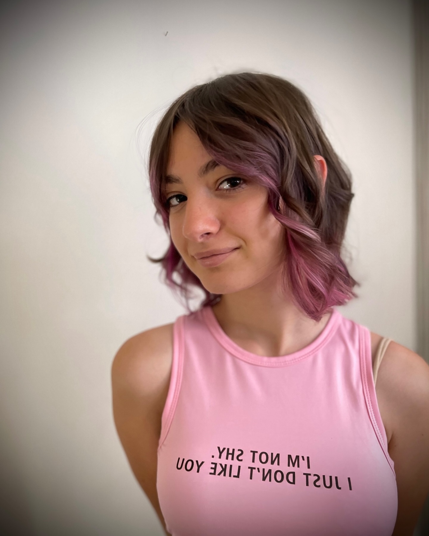 Choppy Chin-Length Layers with Rose-Pink Peekaboo Ends
