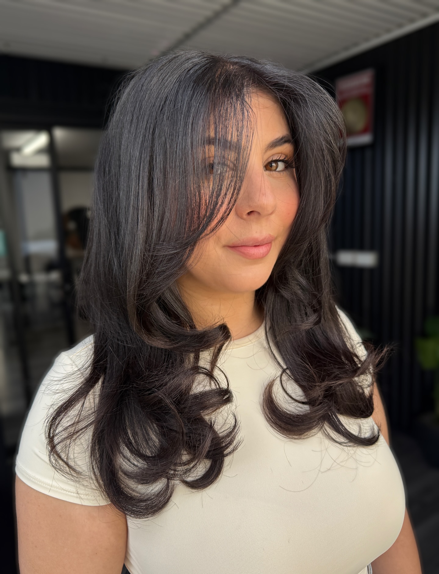 Glossy Long Layers with Wispy Curtain Fringe and Rolled Ends