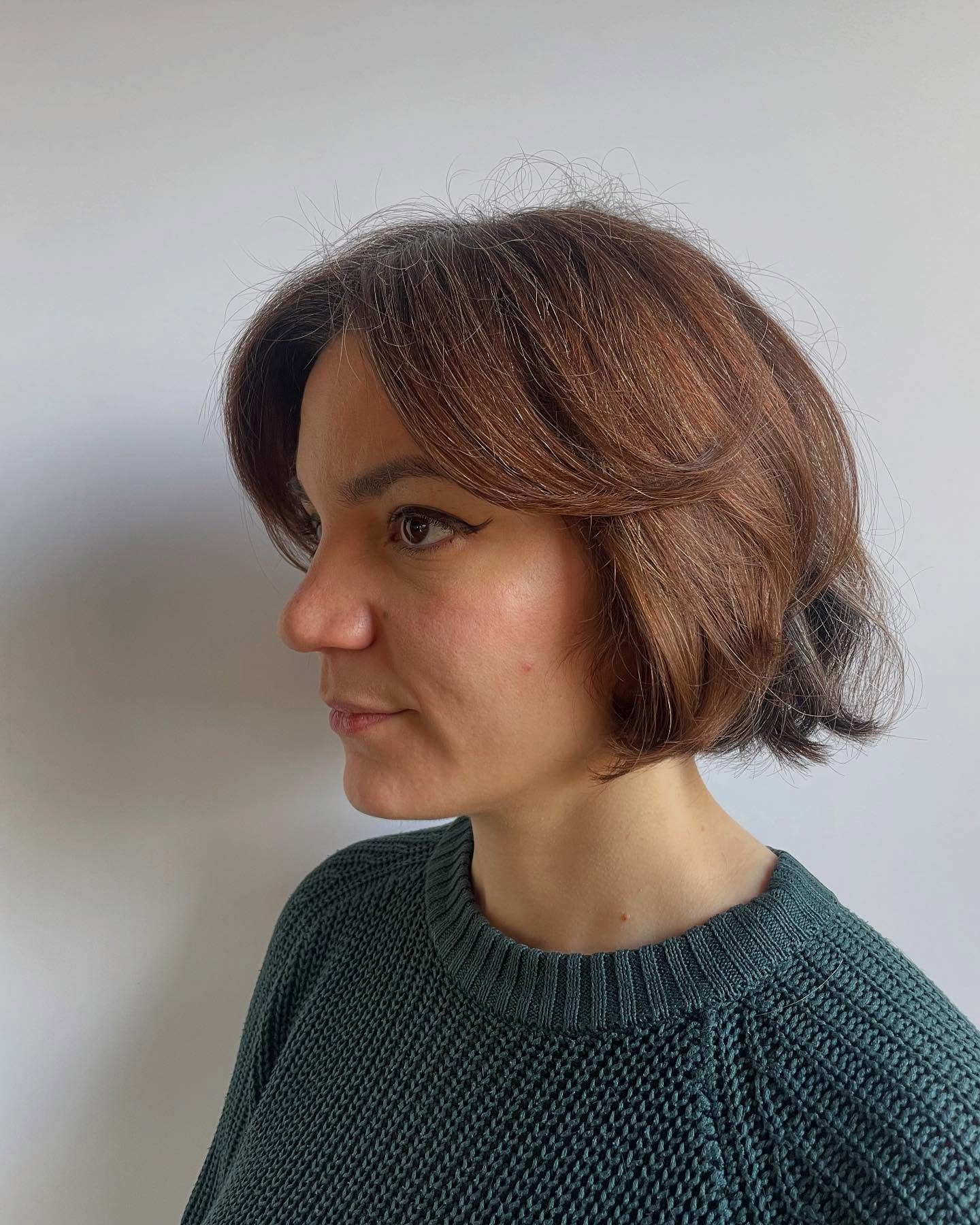 Rounded Chin-Length Layered Bob with Subtle Root Contrast