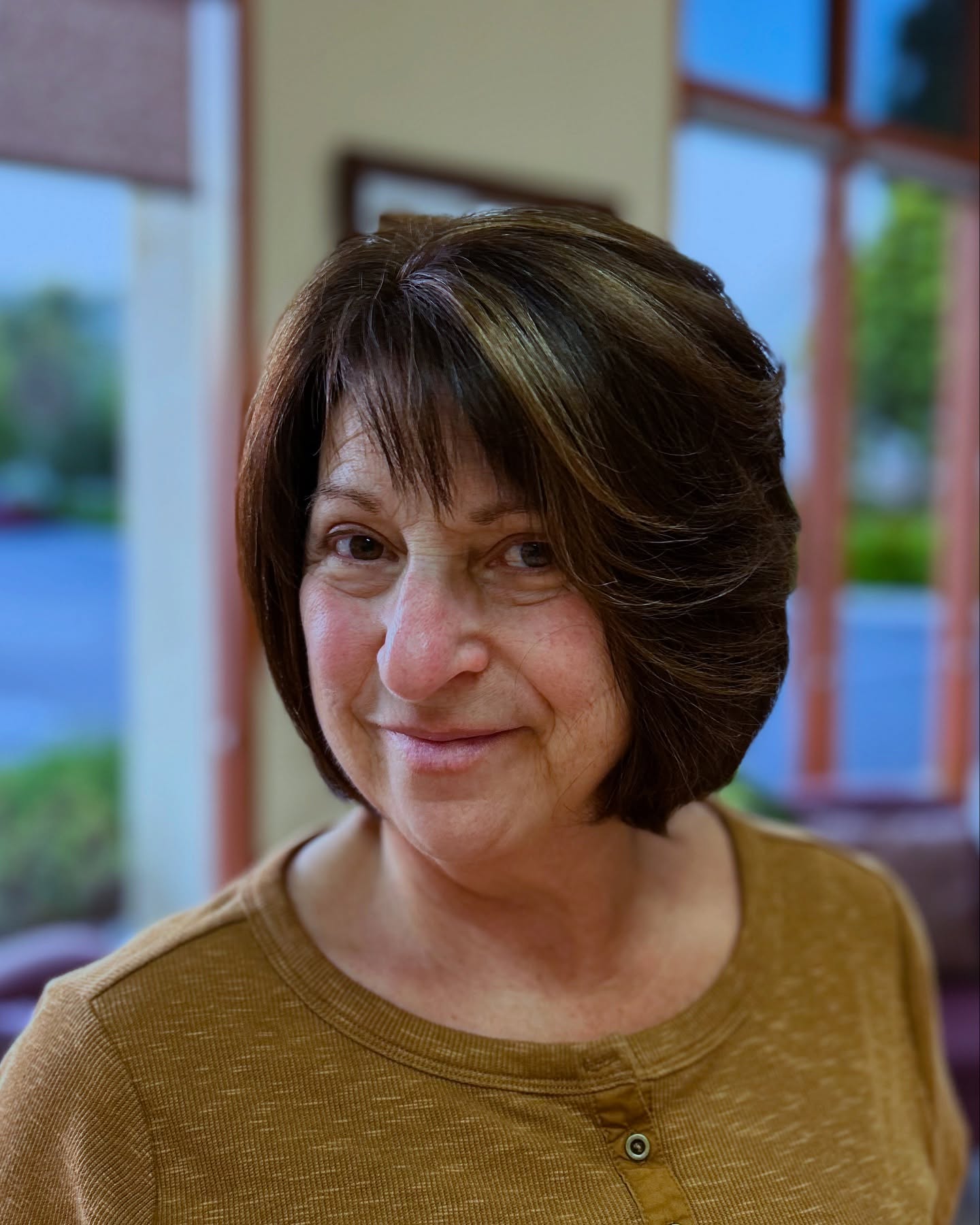 Rounded Chin-Length Layered Bob with Wispy Micro-Fringe and Lowlights
