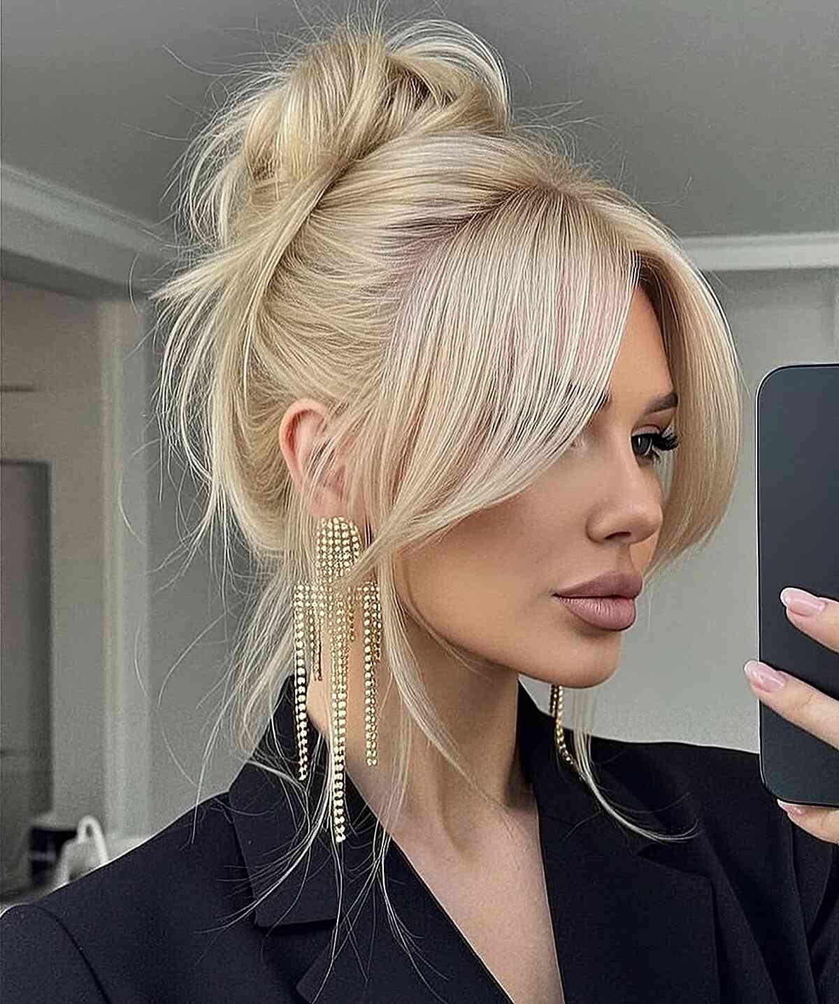 Champagne Blonde Curtain Updo with Face-Framing Layers