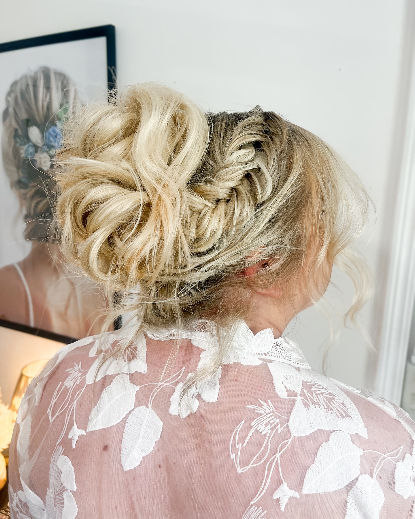 Fishtail-Braided Crown with Low Messy Bun and Ashy Blonde Balayage