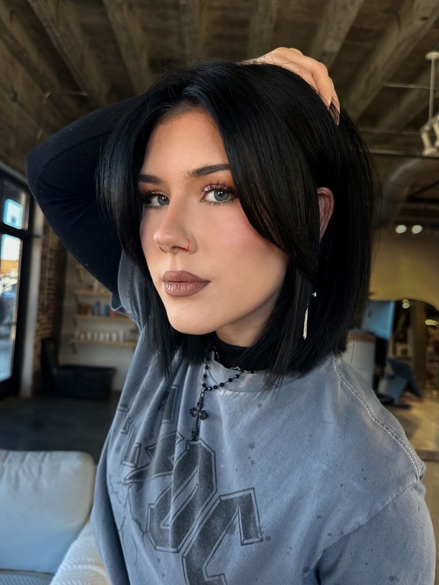 Shiny Jet-Black Chin-Length Blunt Bob with Soft Curtain Fringe