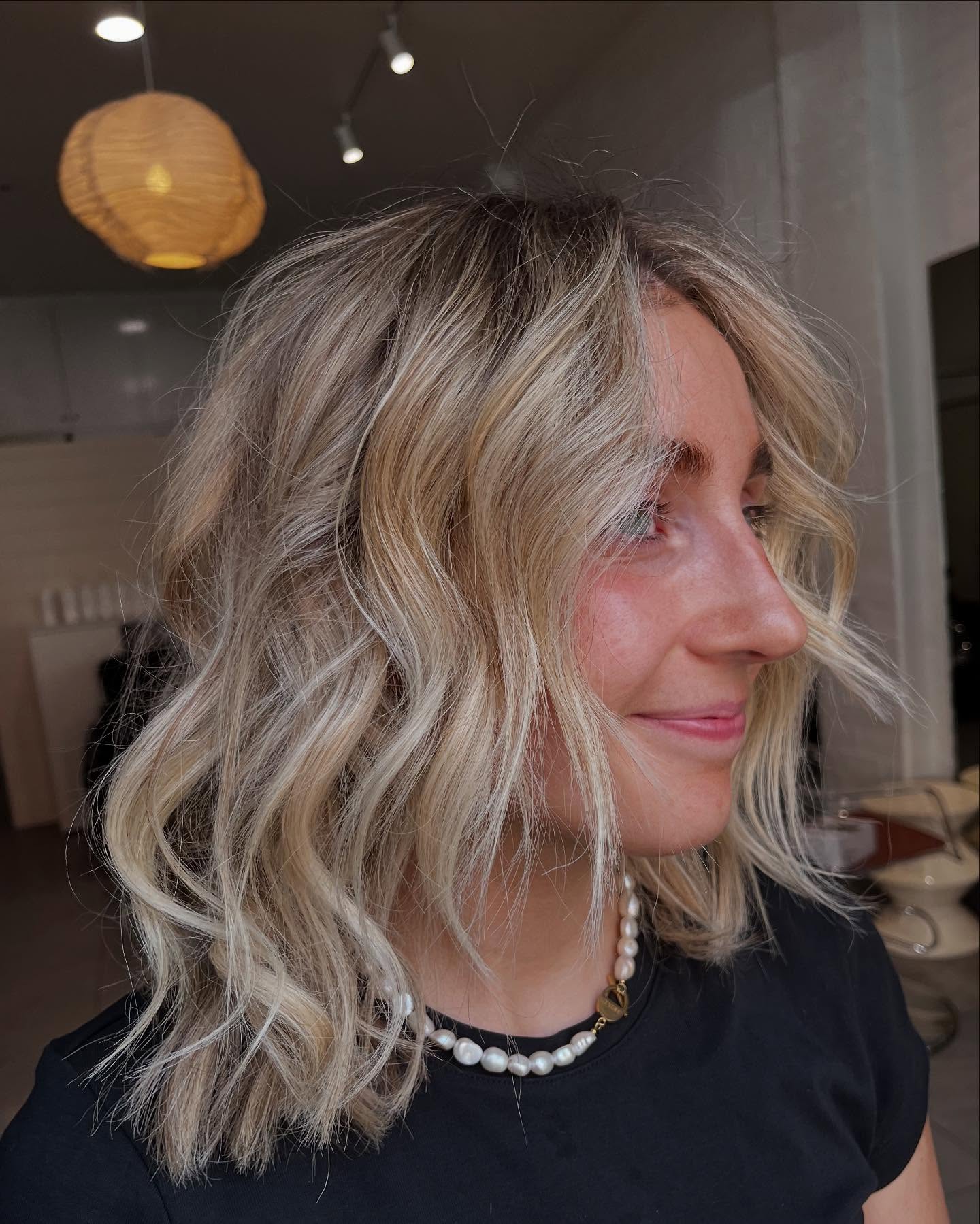 Shoulder-Length Textured Blonde Lob with Soft Curtain Layers