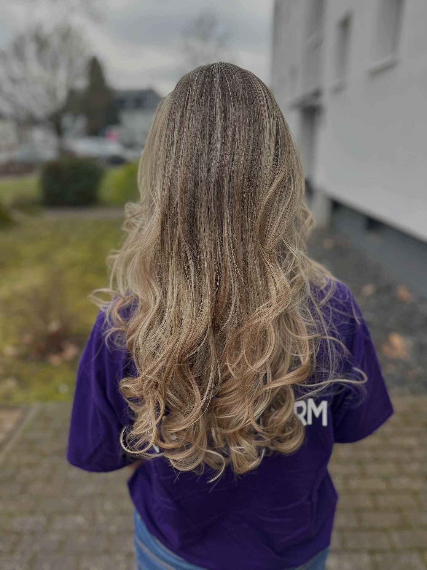 Radiant Long Layered Cut with Defined Curls