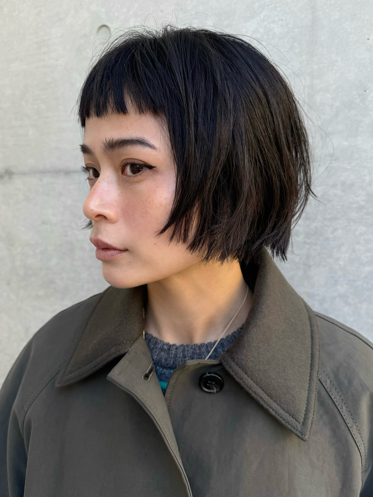 Chic Textured Bob with Bold Bangs