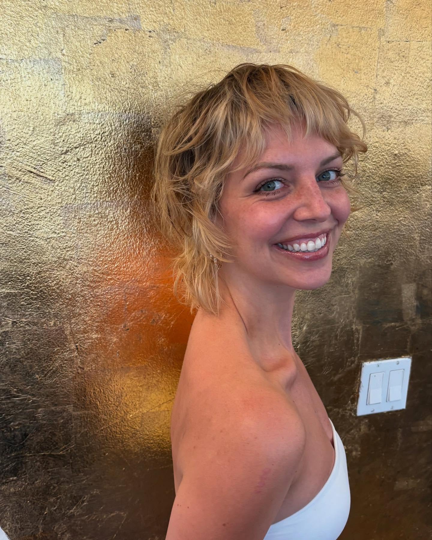 Choppy Textured Blonde Cut with Wispy Layers