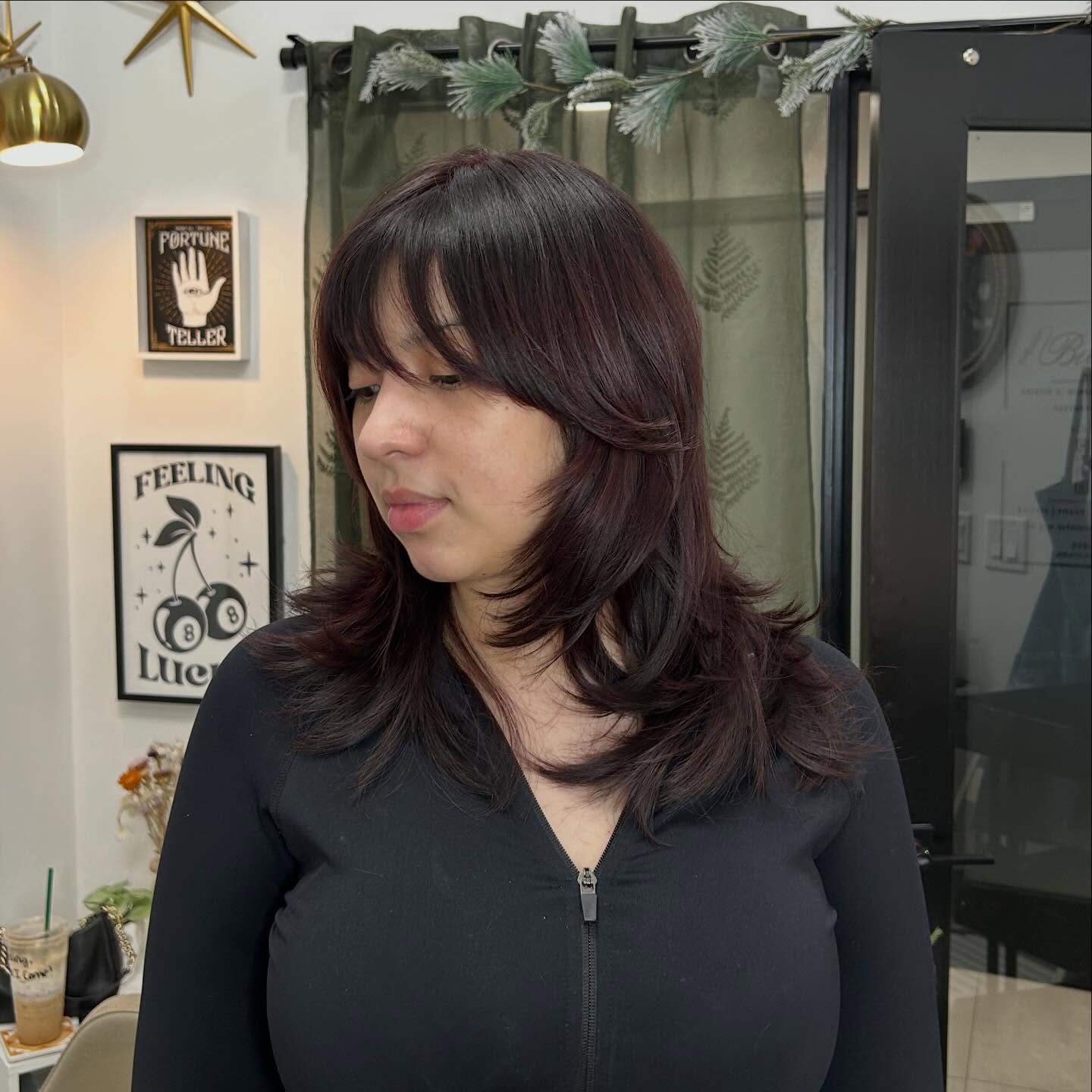 Dynamic Layered Cut with Soft Curtain Bangs