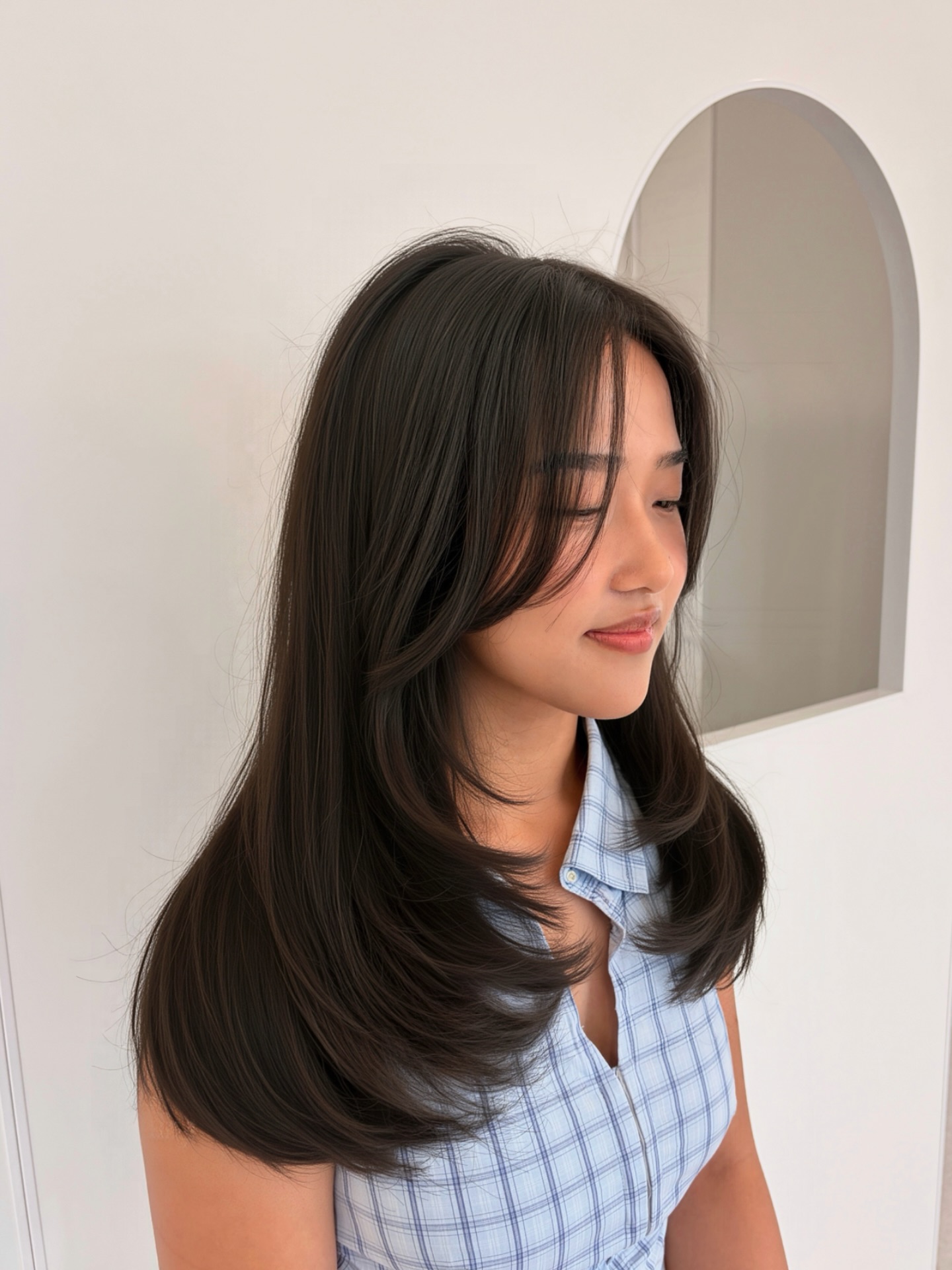 Modern Long Layered Cut with Soft Face-Framing Bangs