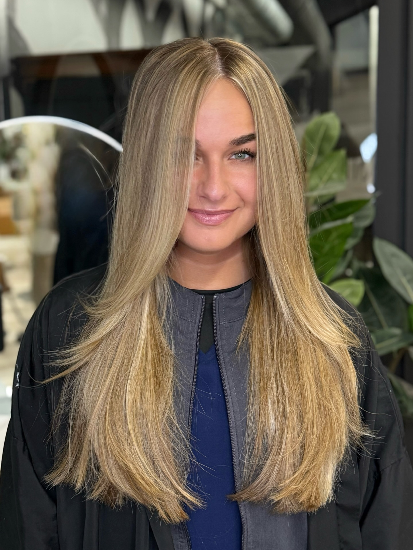 Radiant Long Blonde Layers with Subtle Face-Framing Highlights