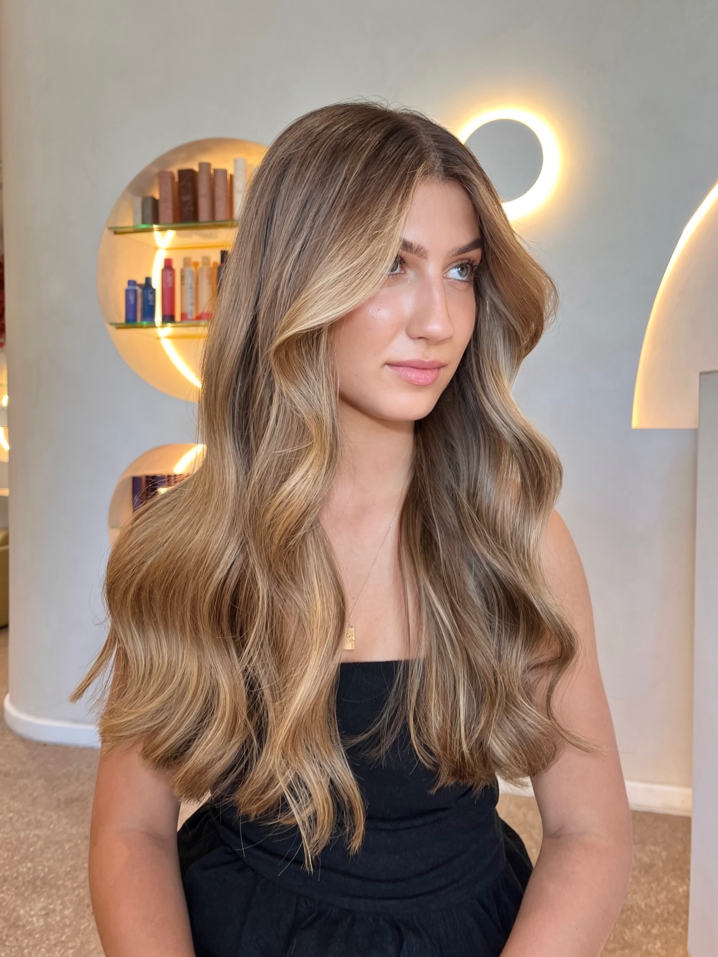 Radiant Long Blonde Waves with Soft Balayage Highlights