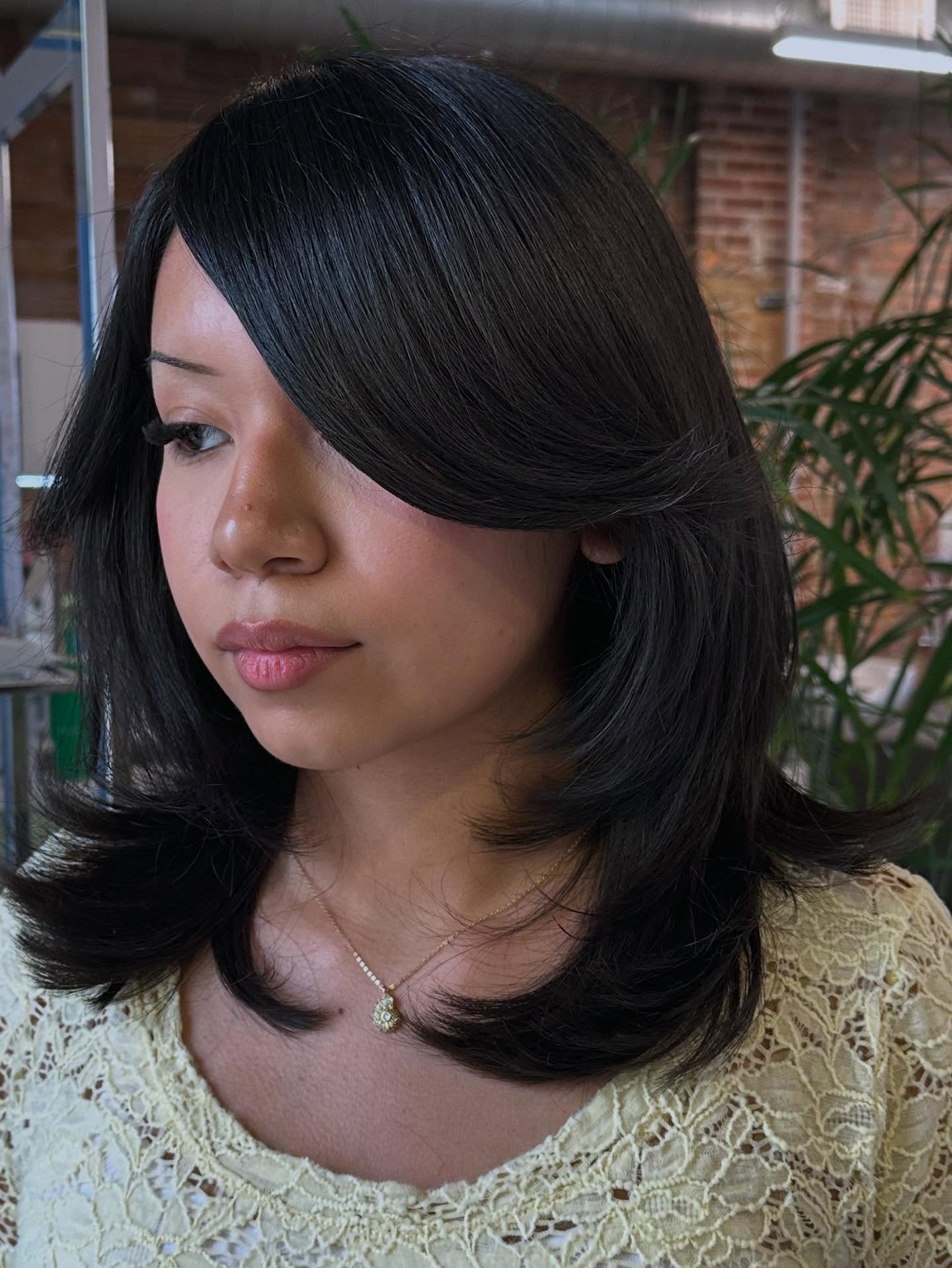 Sleek Long Cut with Side-Swept Bangs