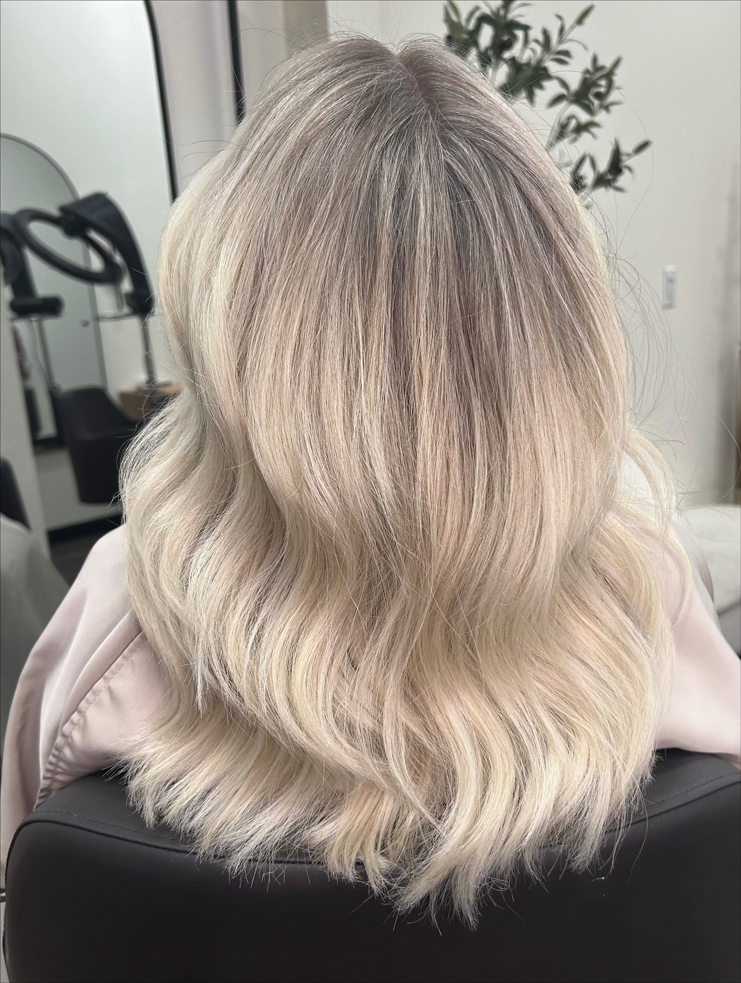 Softly Layered Beachy Waves with Light Platinum Tones