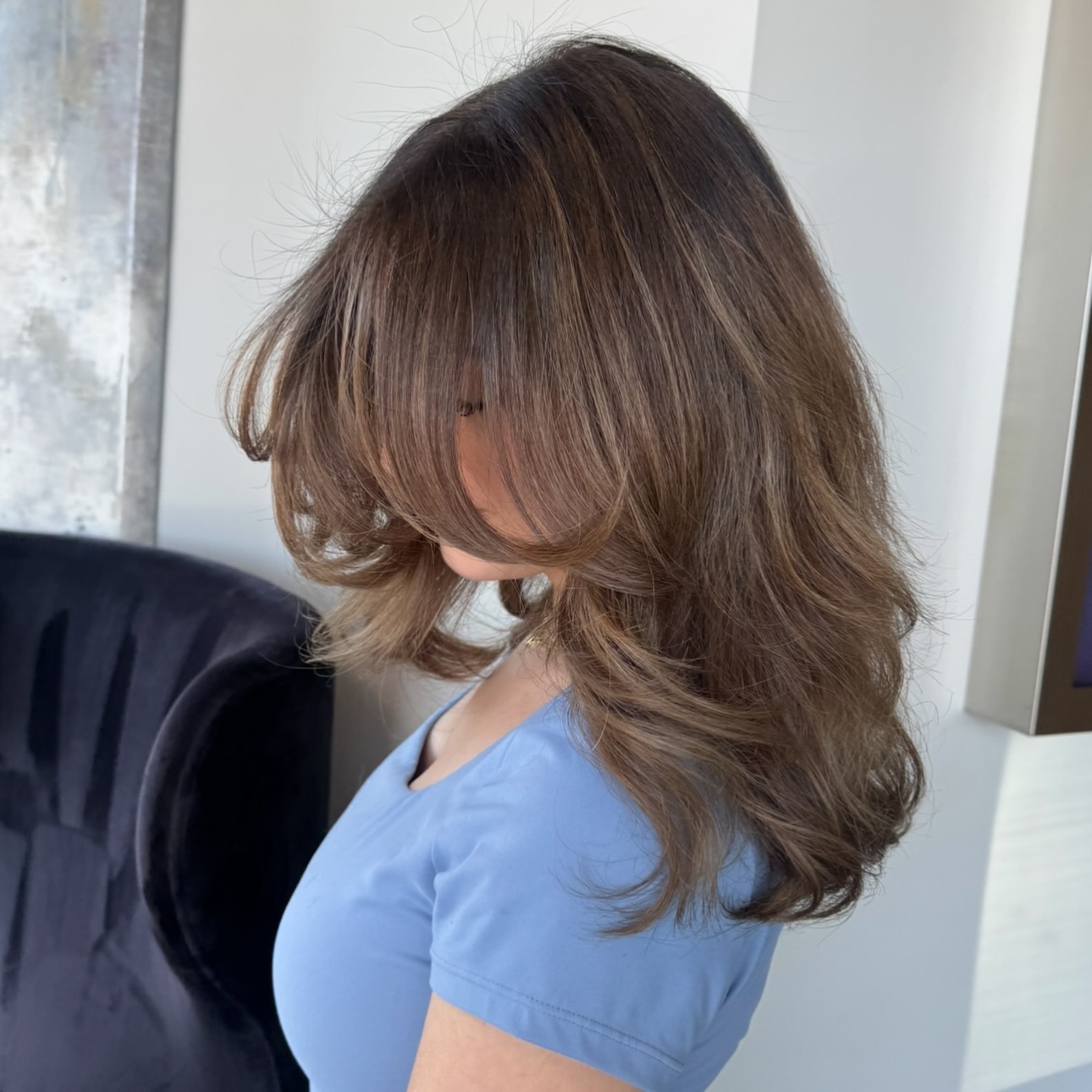 Softly Layered Mid-Length Hair with Face-Framing Bangs