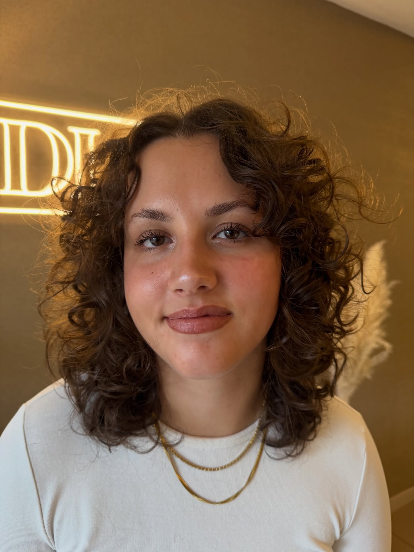 Charming Medium Curly Cut with Soft Textured Layers