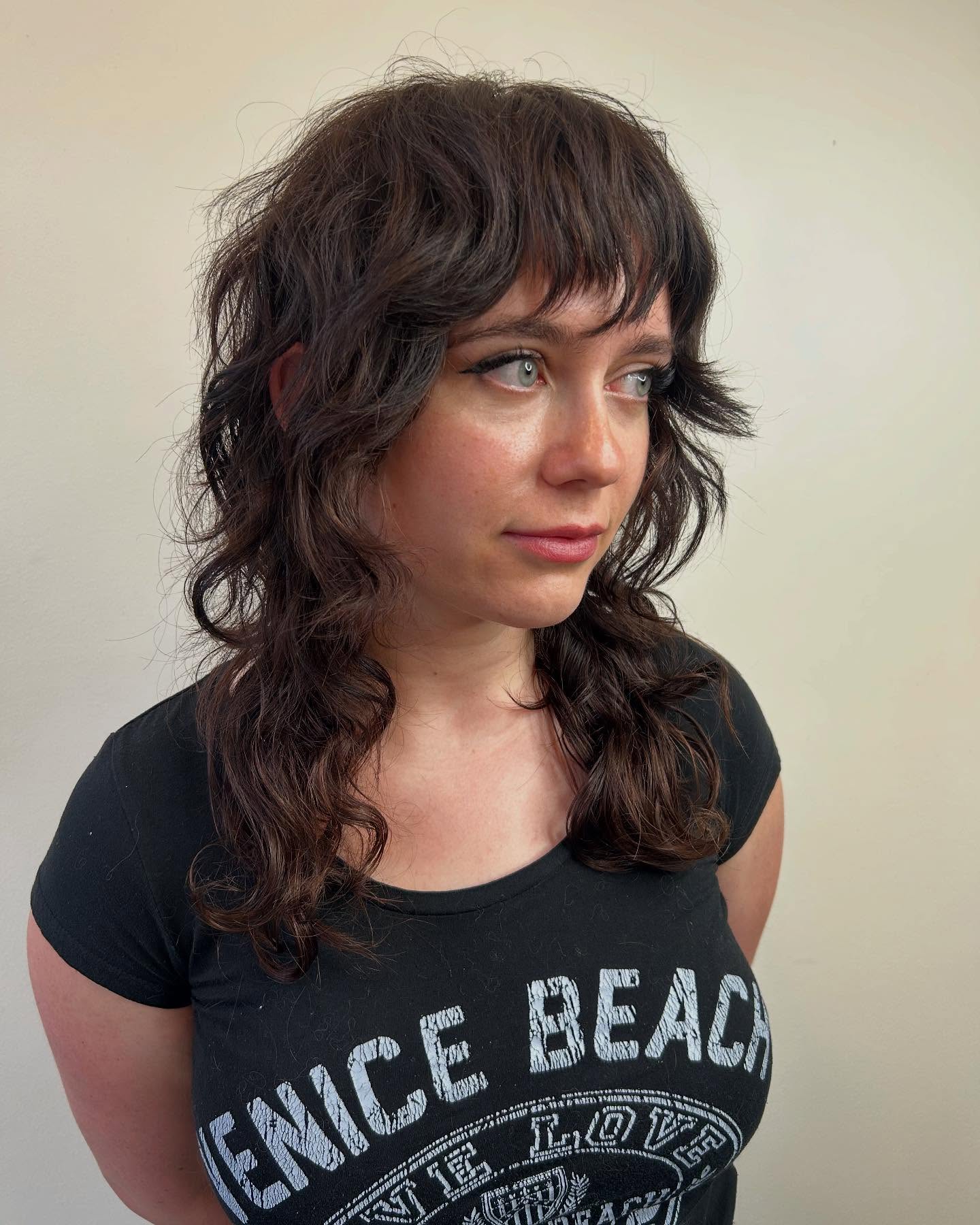 Chic Curly Shag with Soft Bangs