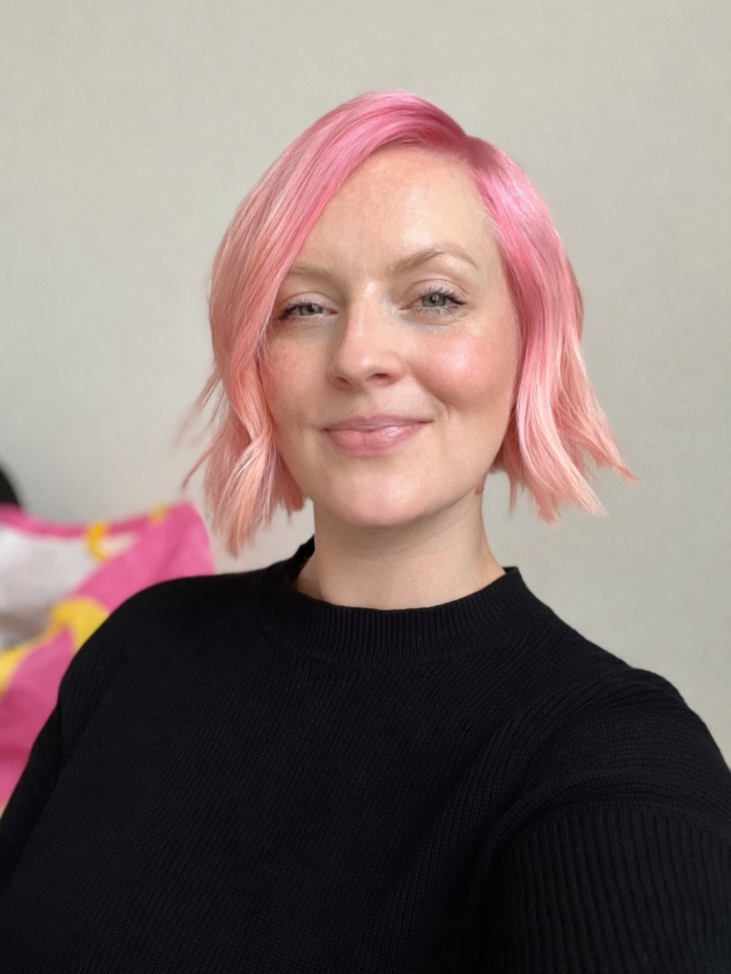 Chic Textured Bob with Soft Pink Highlights