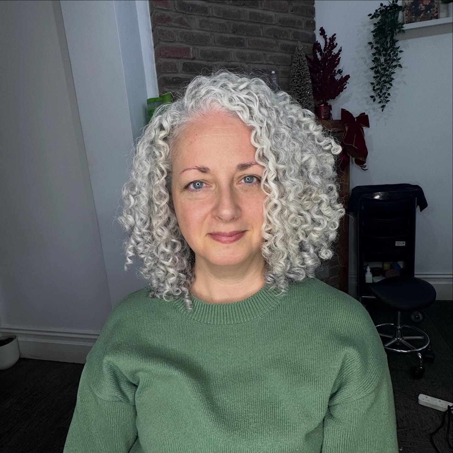 Classic Curly Mid-Length Cut with Defined Ringlets