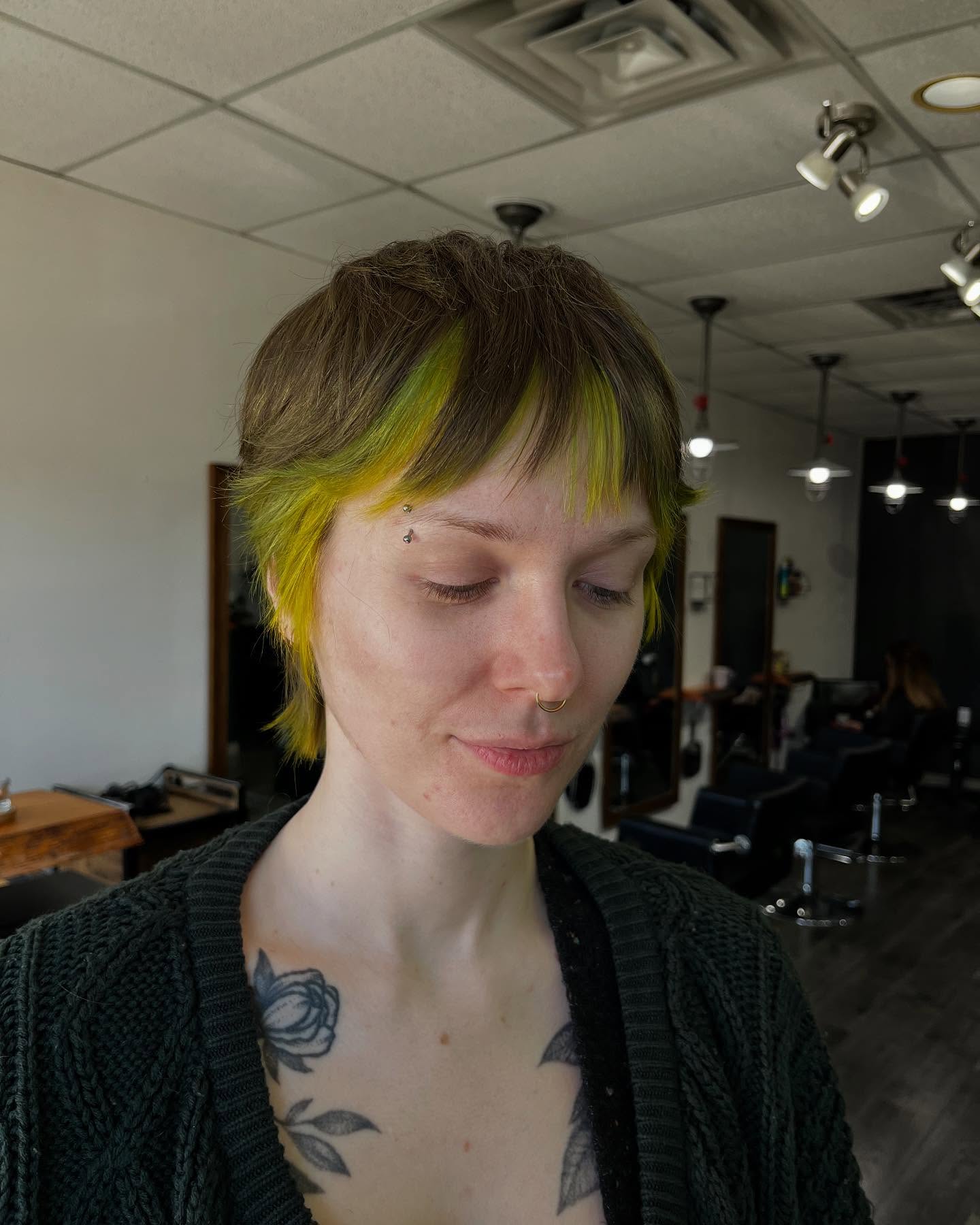 Edgy Shaggy Pixie with Bold Yellow Highlights