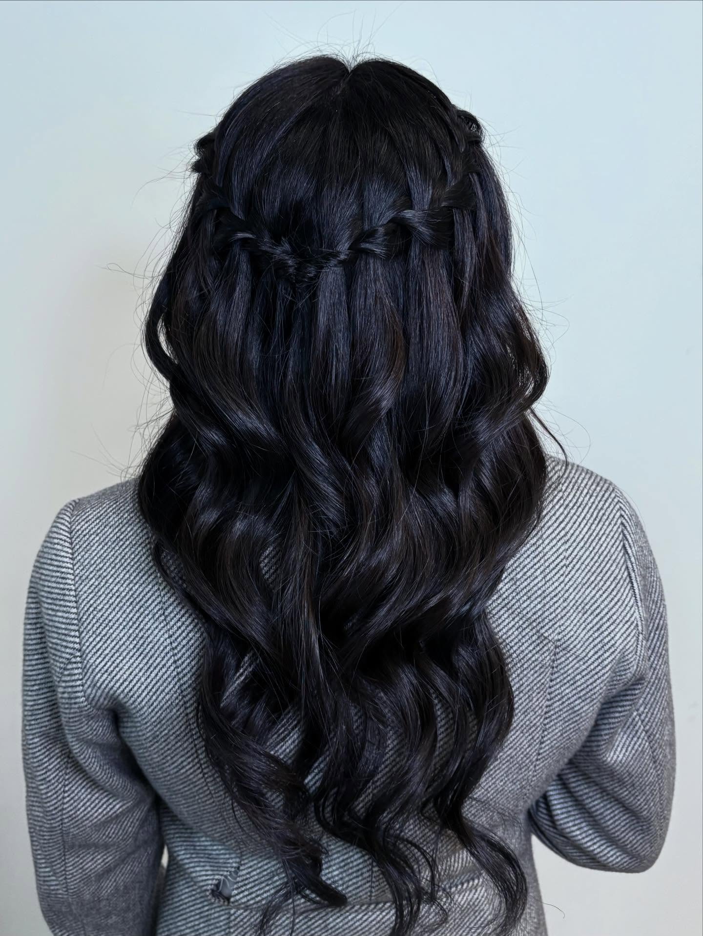 Elegant Half-Up Braided Waves with Loose Curls