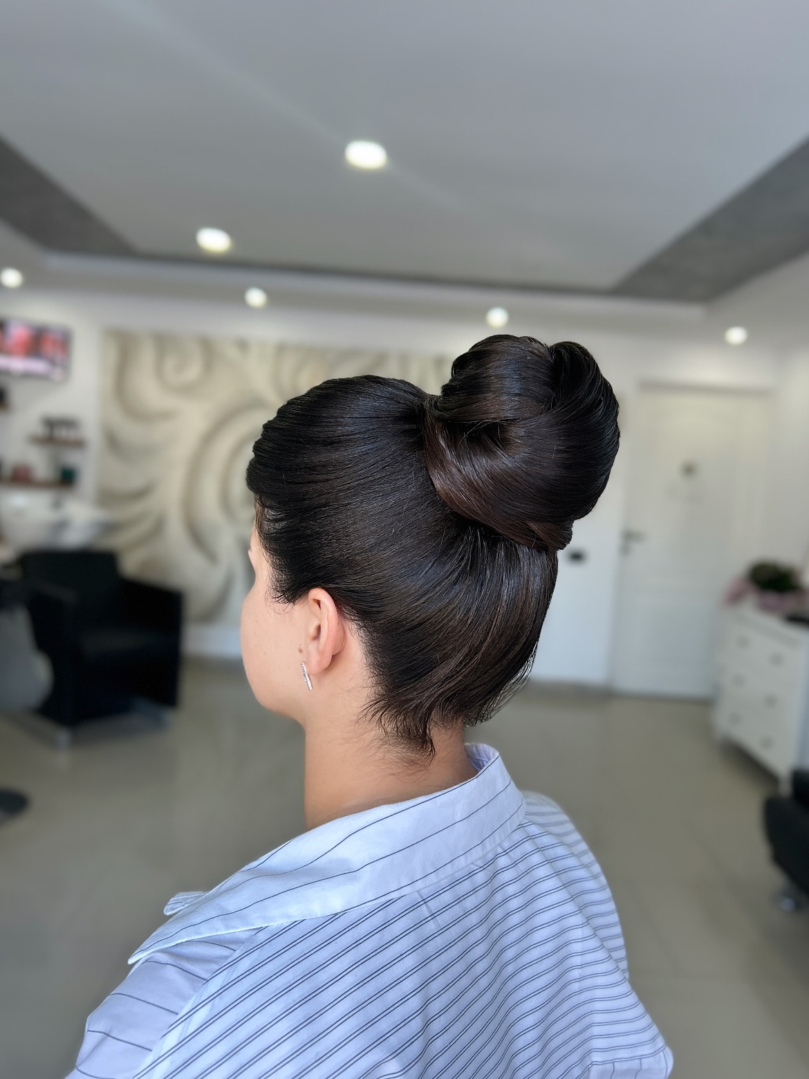 Elegant Twisted Bun with Sleek Finish