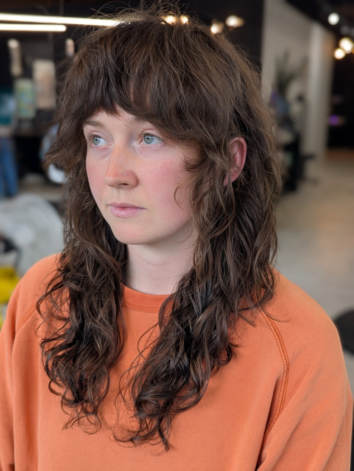 Layered Shag with Soft Waves and Curtain Bangs