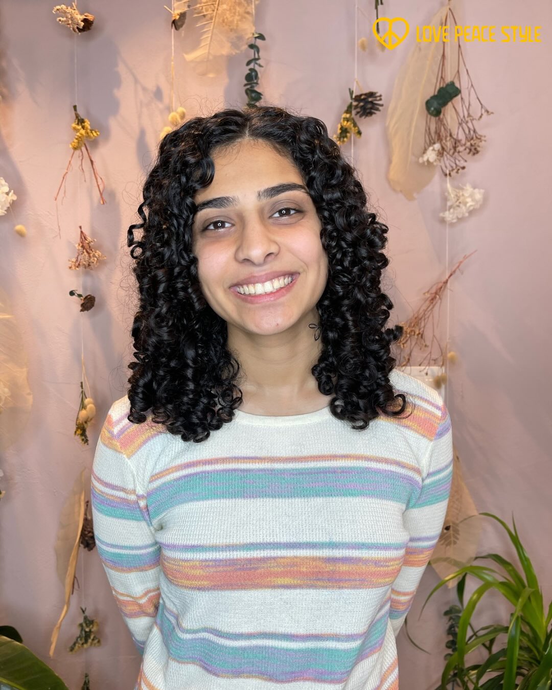 Playful Medium Curly Cut with Defined Curls