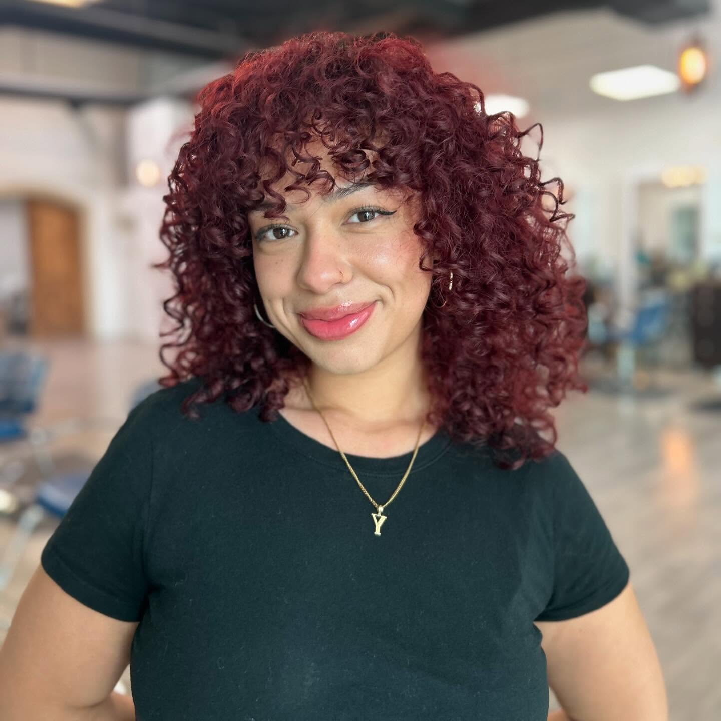 Playful Medium Curly Cut with Vibrant Red Color