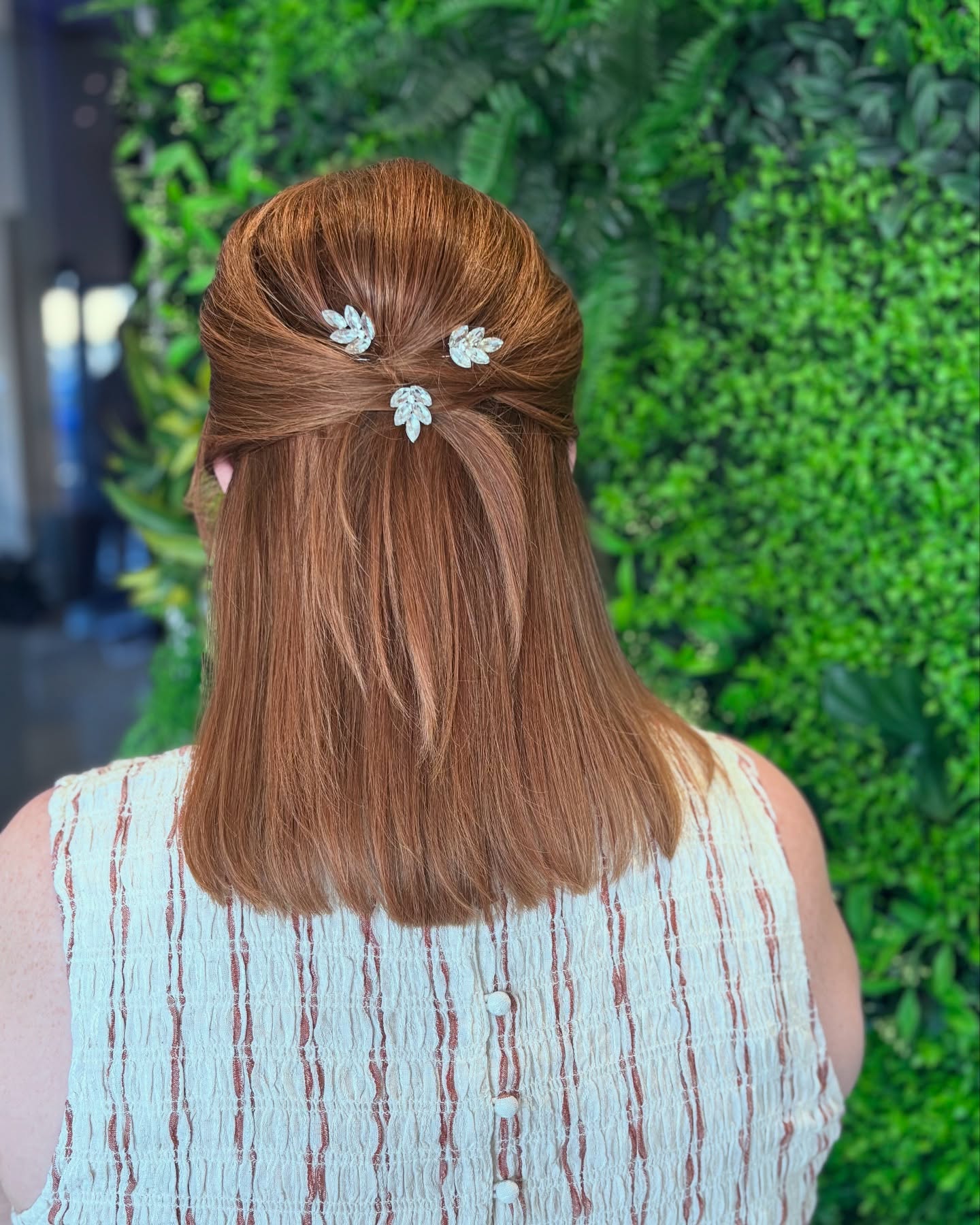 Sleek Half-Up Style with Decorative Clips