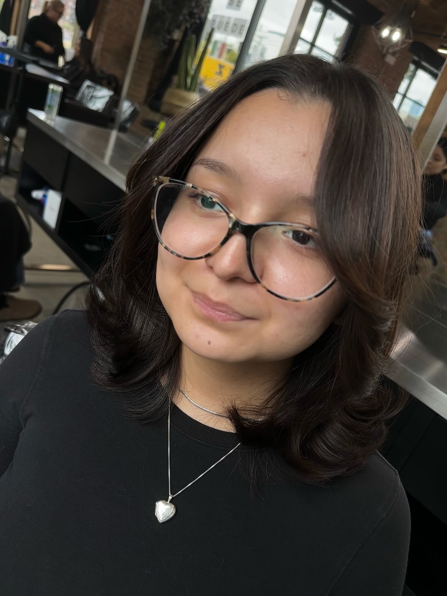 Softly Layered Shoulder-Length Hair with Curtain Bangs