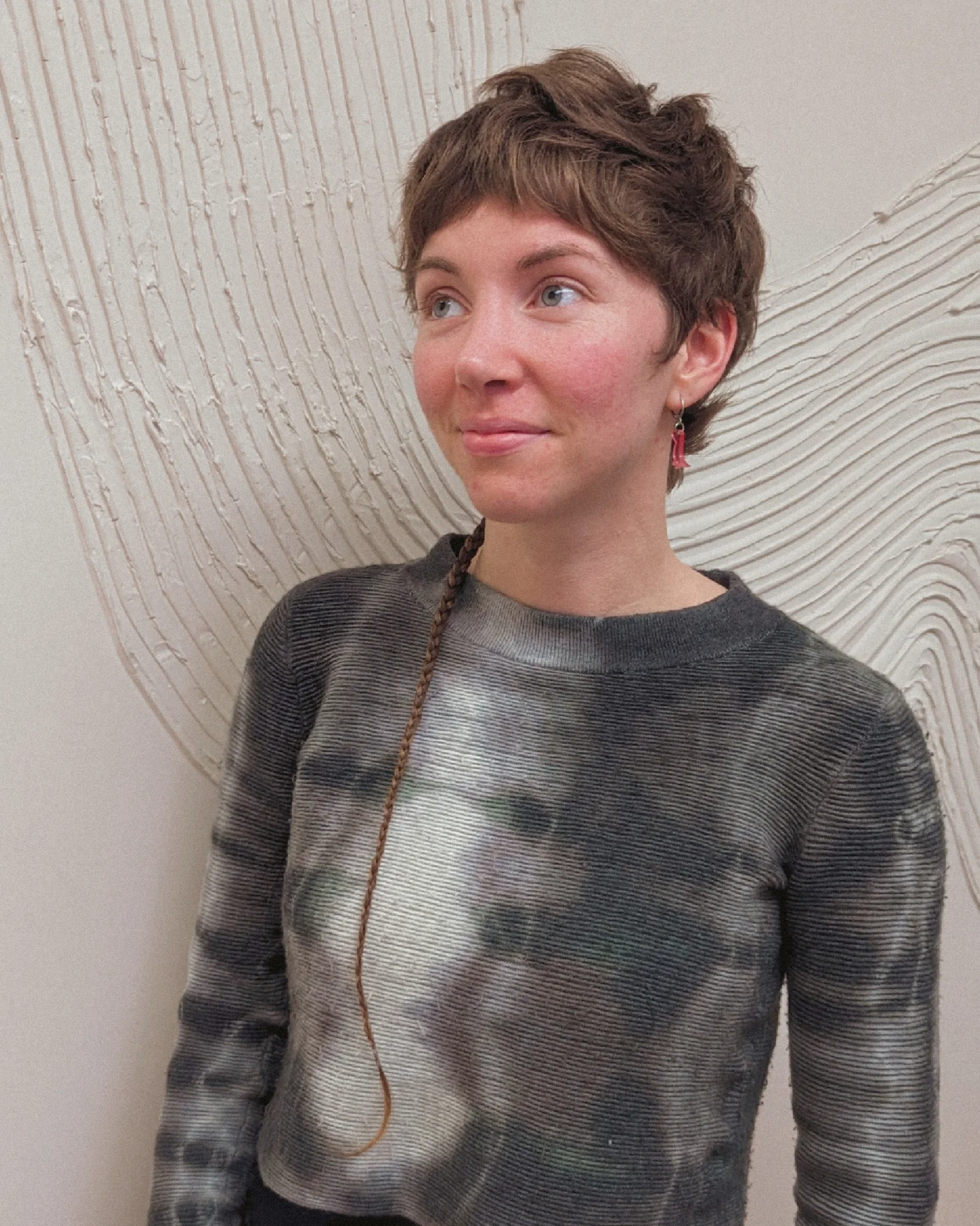 Stylish Textured Shaggy Pixie with Unique Side Braid