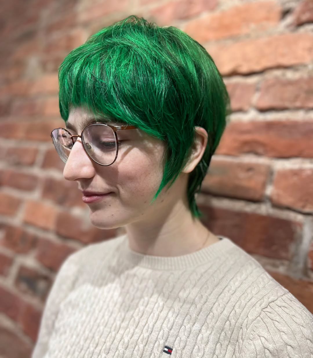 Vibrant Green Shaggy Pixie with Soft Bangs