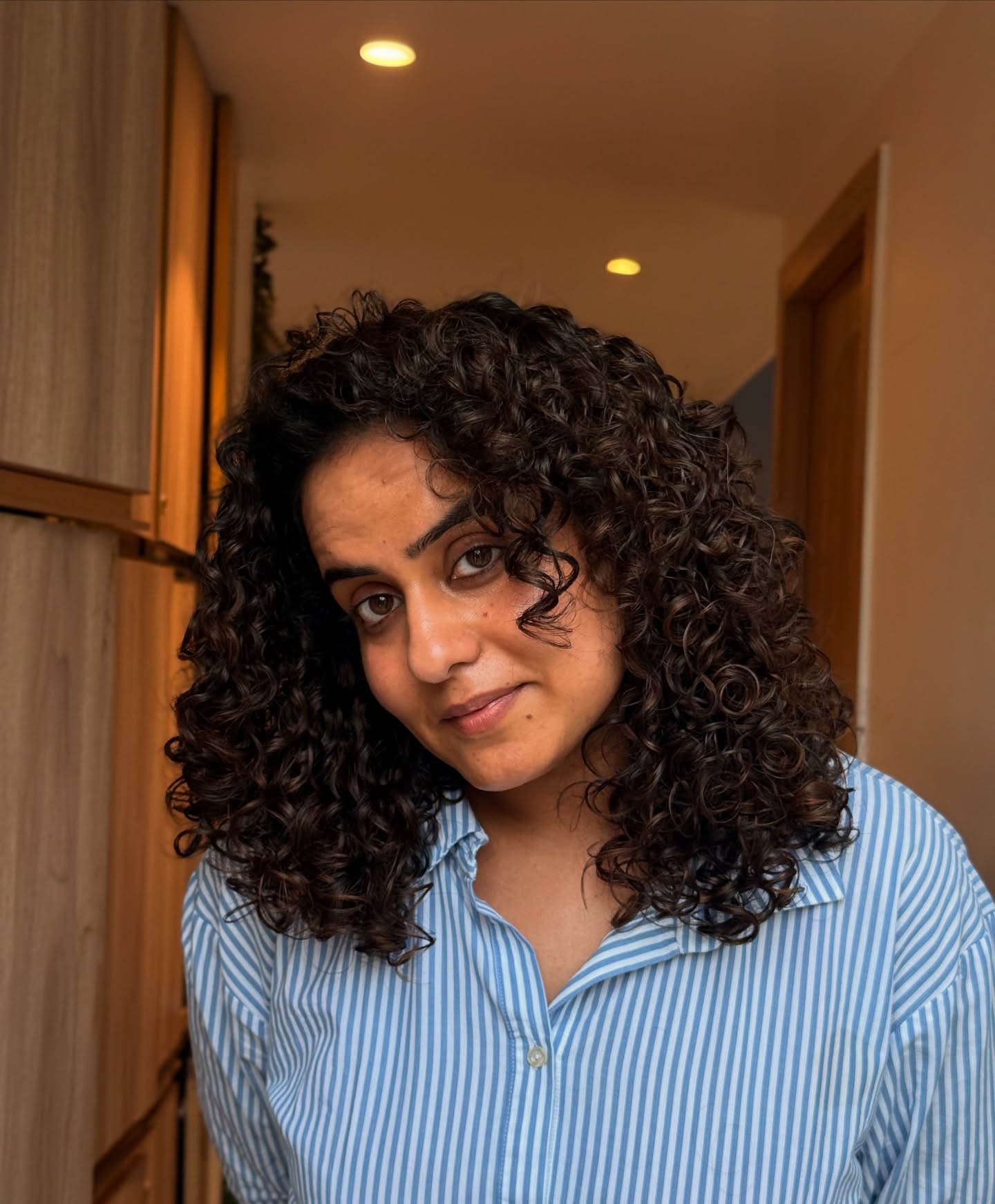 Voluminous Medium Curly Cut with Defined Ringlets