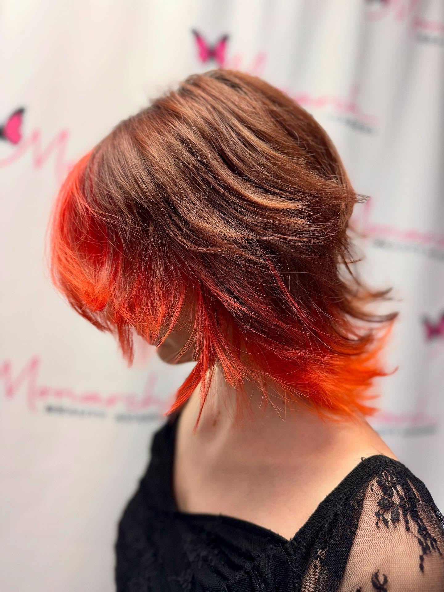 Bold Layered Wolf Cut with Fiery Red Accents