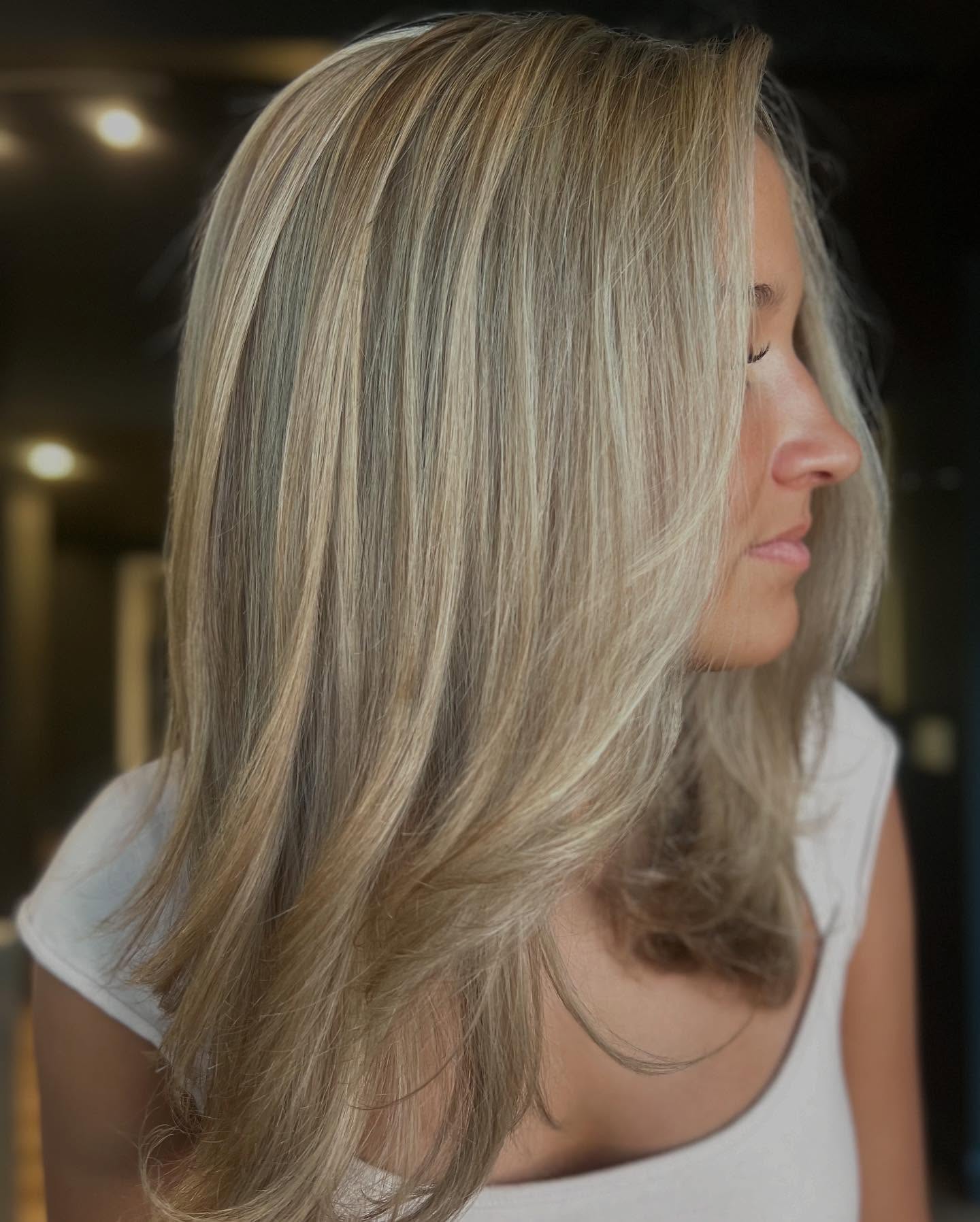Bright Blonde Long Layers with Soft Movement