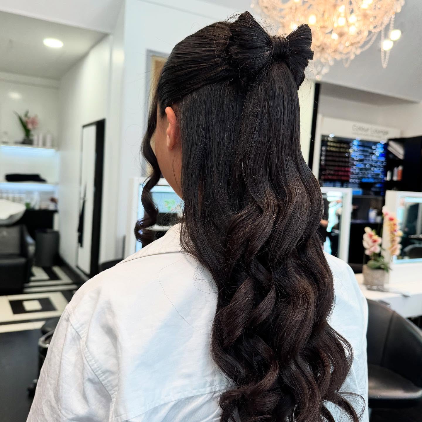 Chic Half-Up Bow with Loose Curls