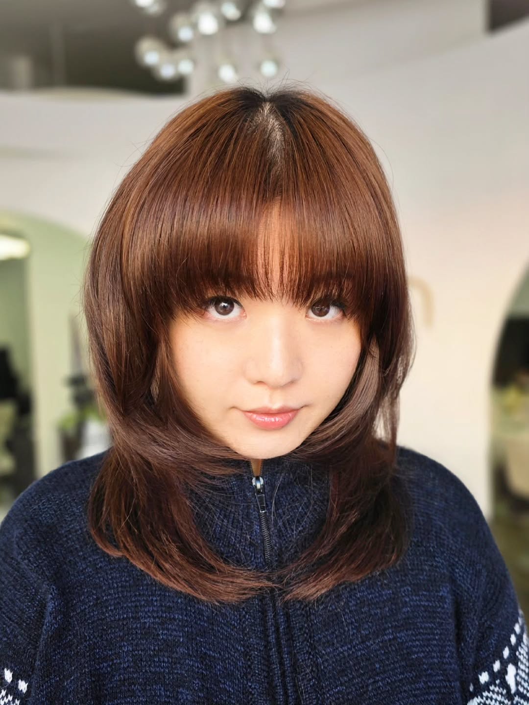 Chic Layered Cut with Soft Bangs