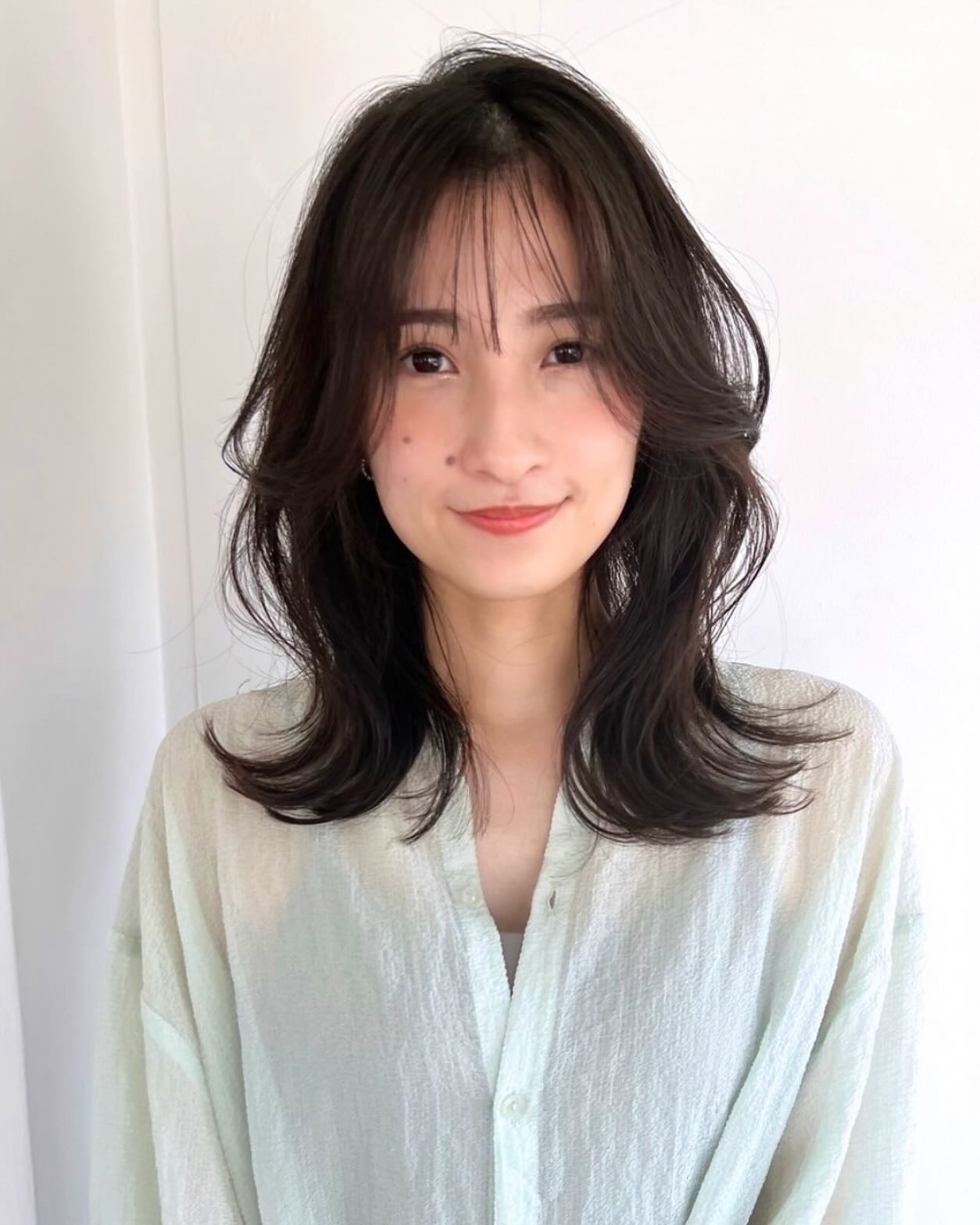 Chic Layered Medium Cut with Soft Waves