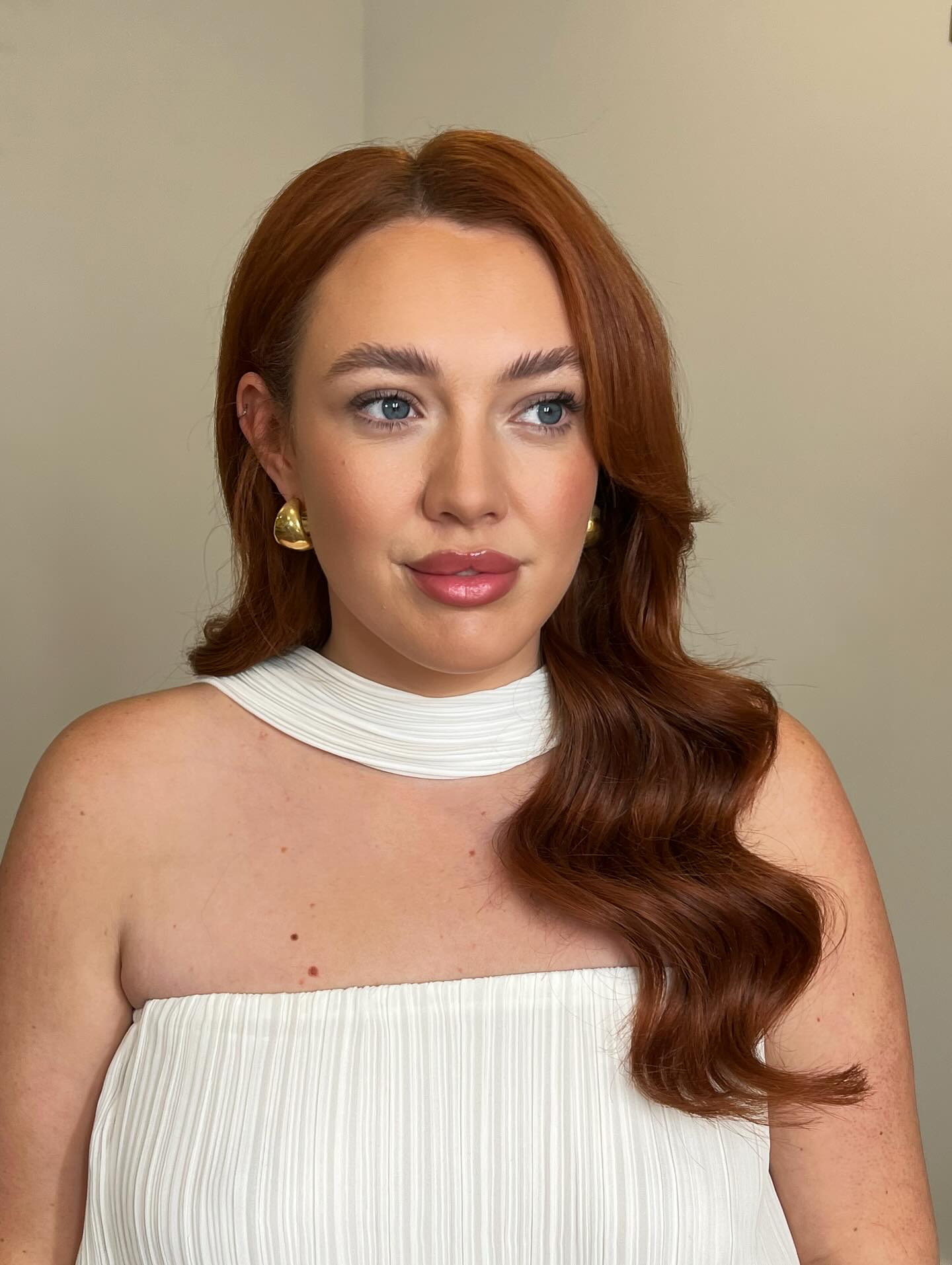 Elegant Auburn Waves with Soft Volume