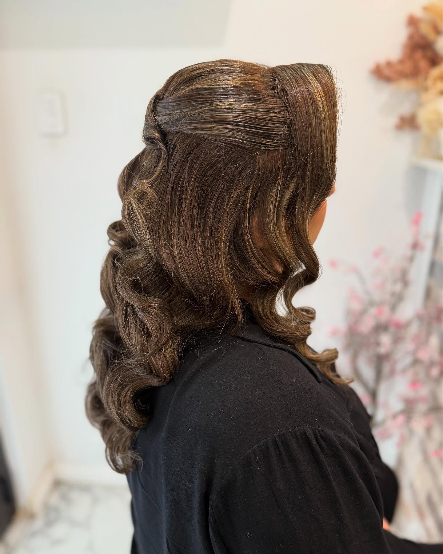 Elegant Half-Down Curls with a Twist