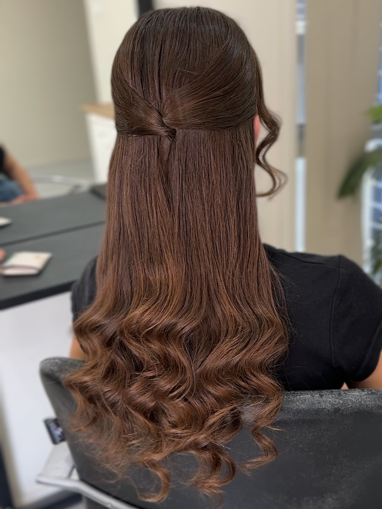 Elegant Half-Down Soft Curls with Twisted Accent