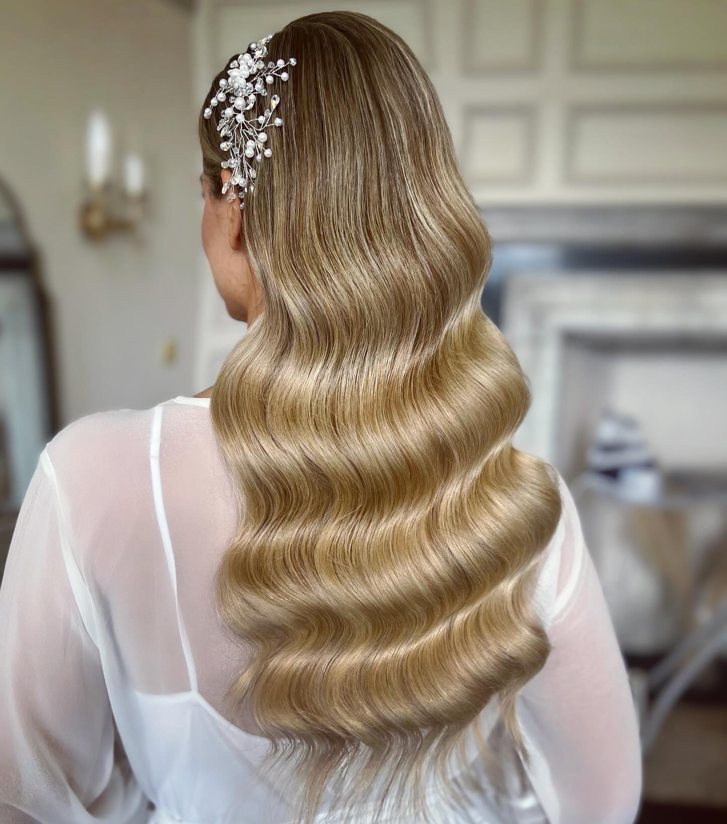 Glamorous Glossy Waves with Elegant Hair Accessory