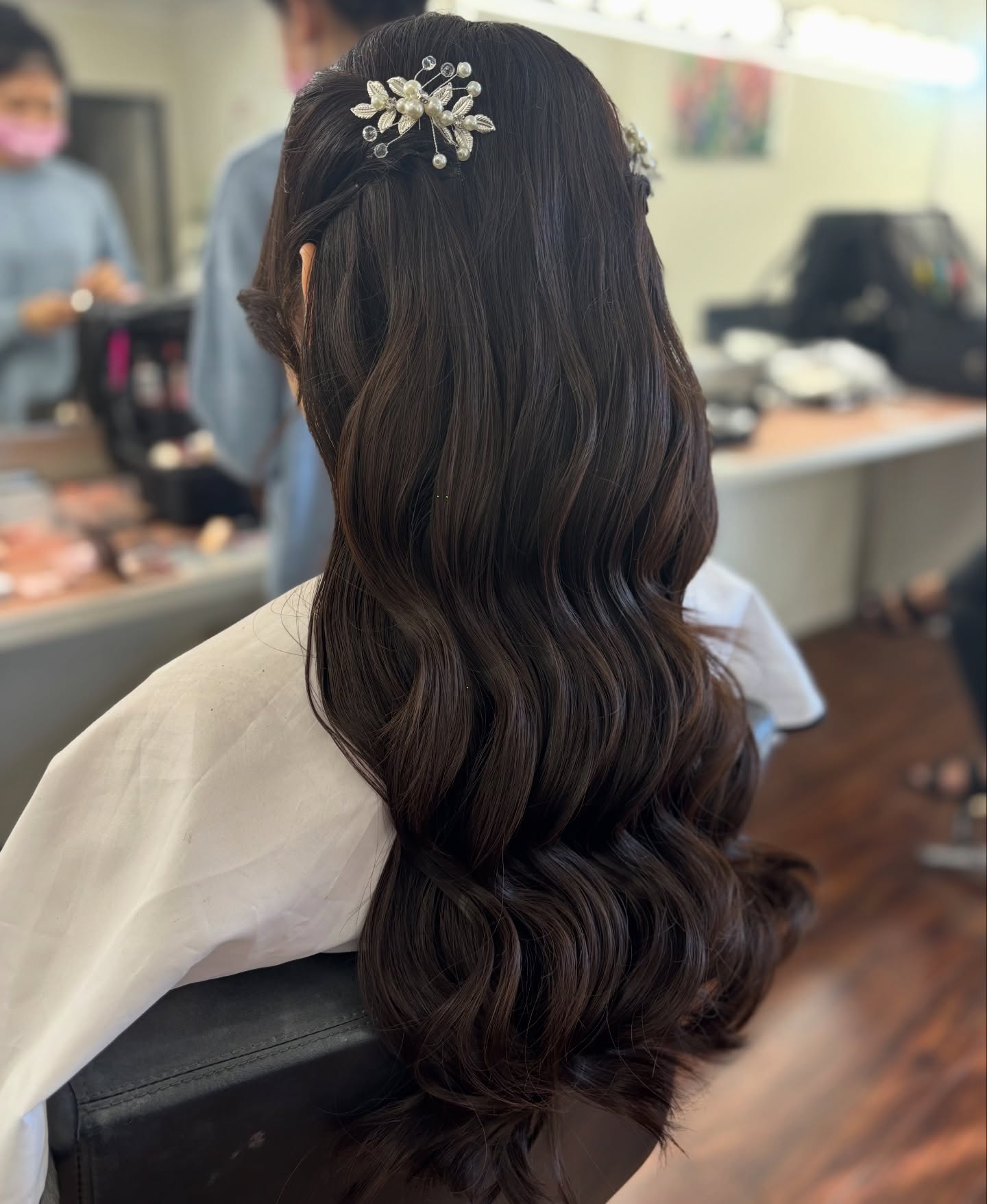 Glamorous Long Glossy Waves with Floral Accents