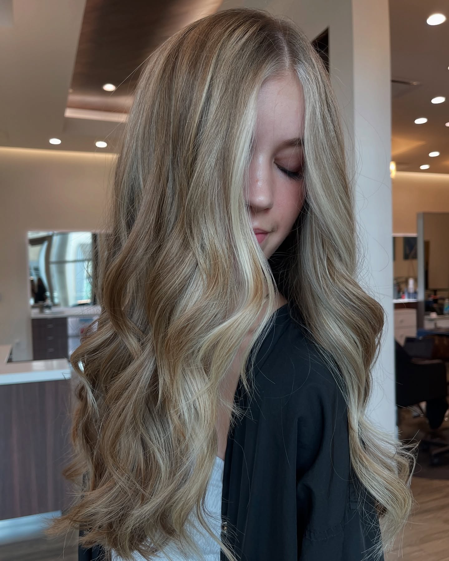 Soft Blonde Waves with Subtle Highlights