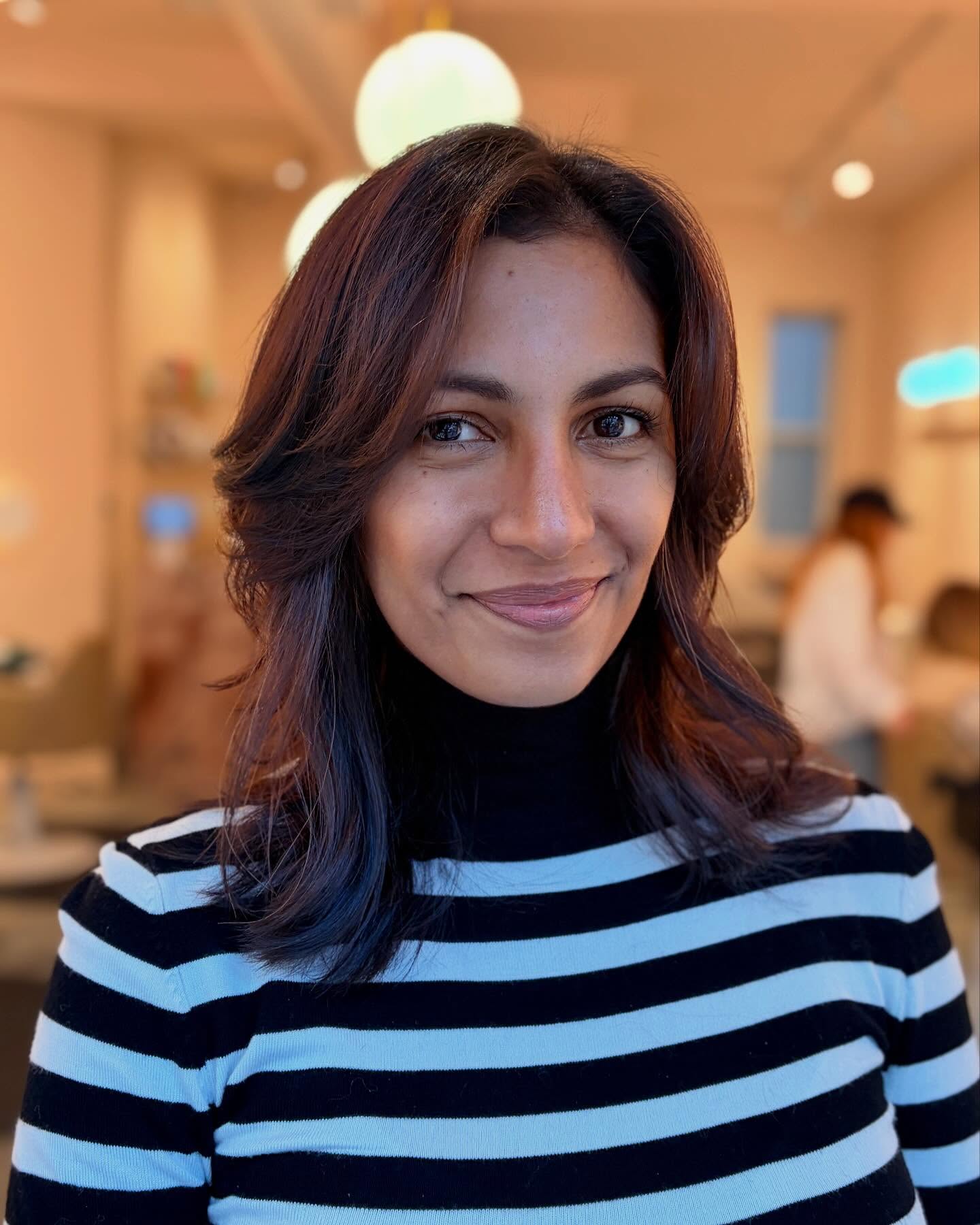 Stylish Layered Lob with Subtle Blue Undertones