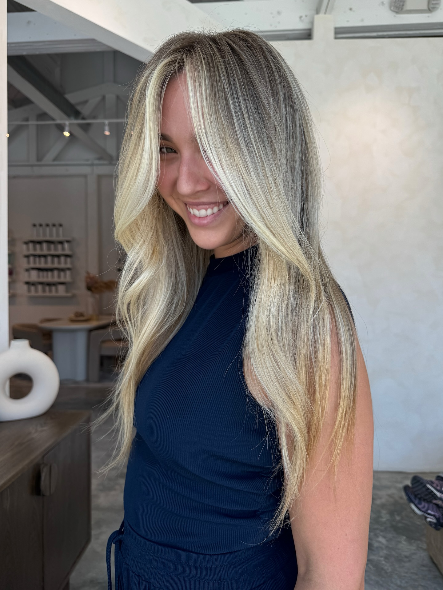 Sun-Kissed Long Blonde Layers with Face-Framing Highlights