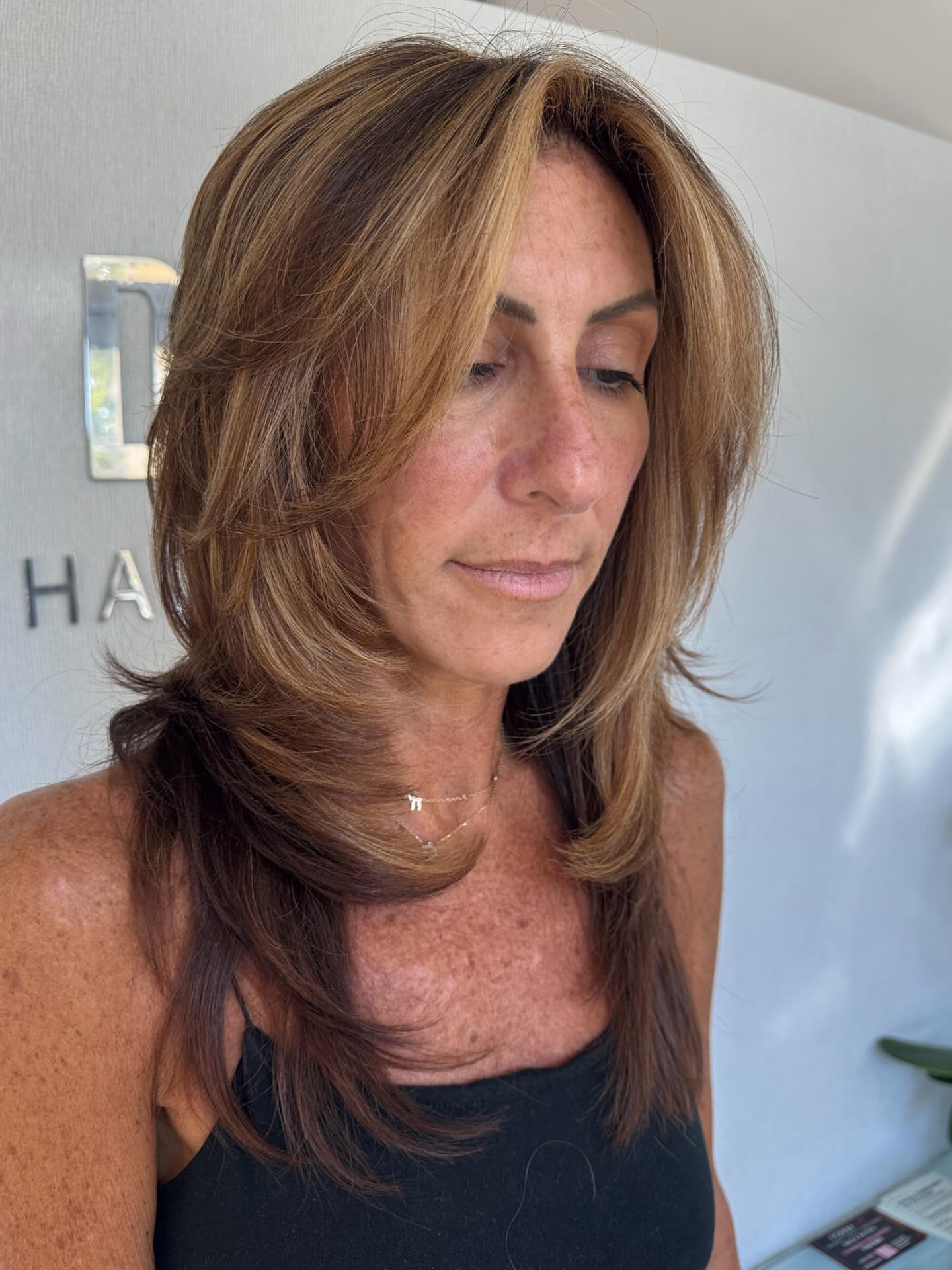 Textured Layered Wolf Cut with Sun-Kissed Highlights