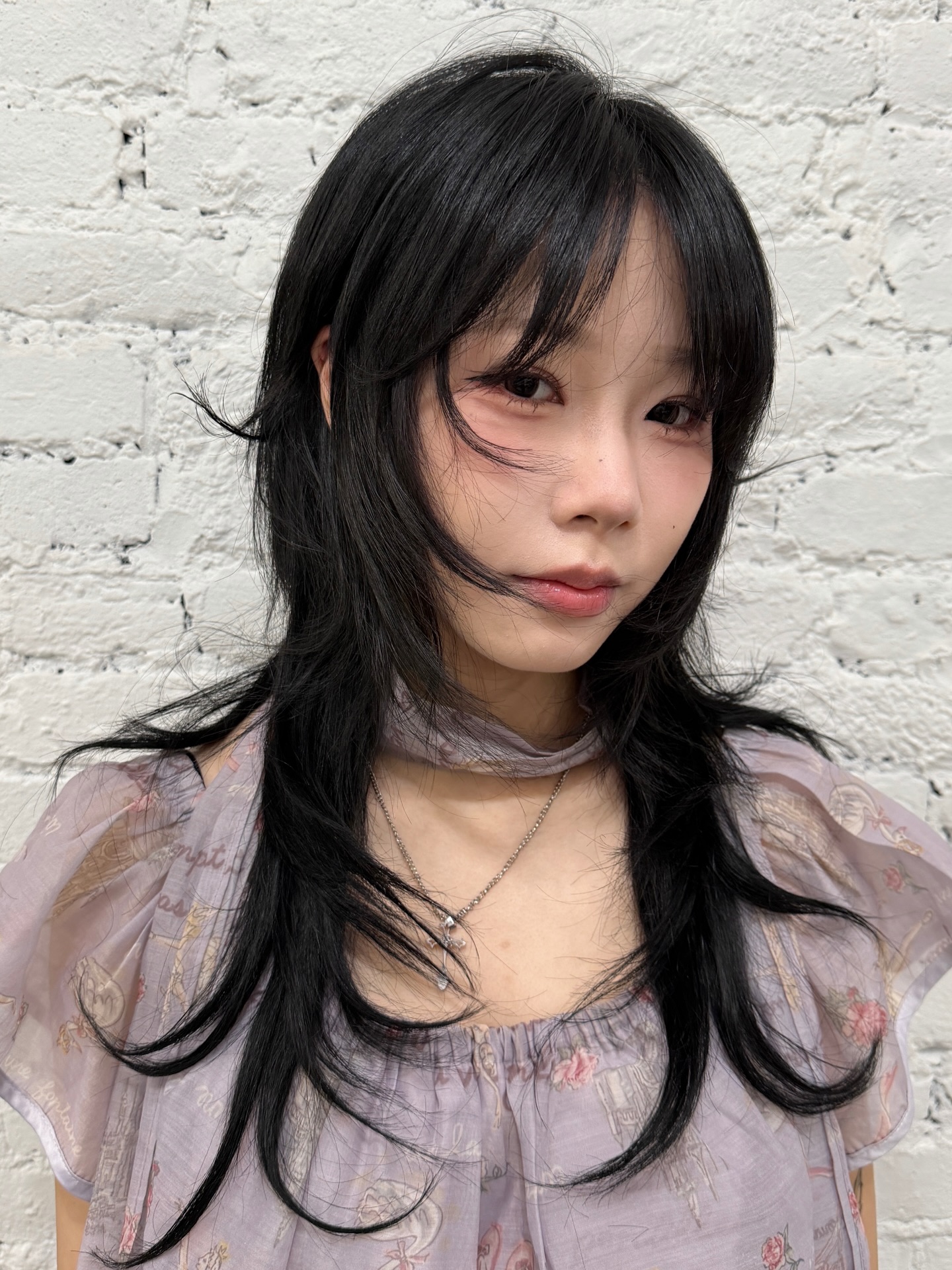 Textured Layered Wolf Cut with Wispy Bangs