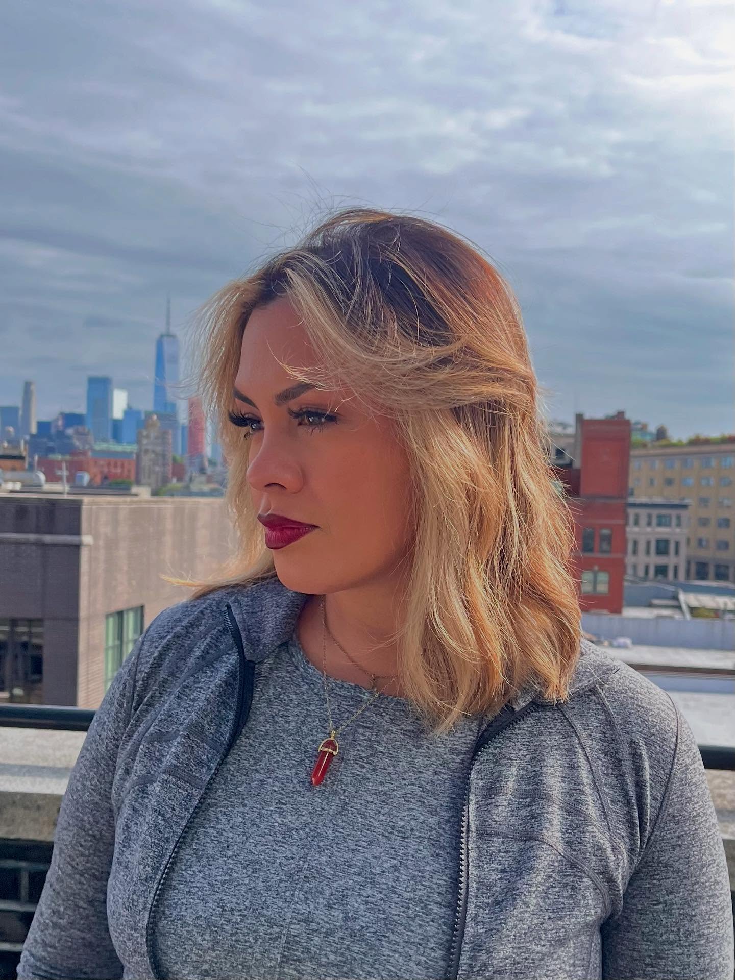 Trendy Layered Lob with Sun-Kissed Highlights